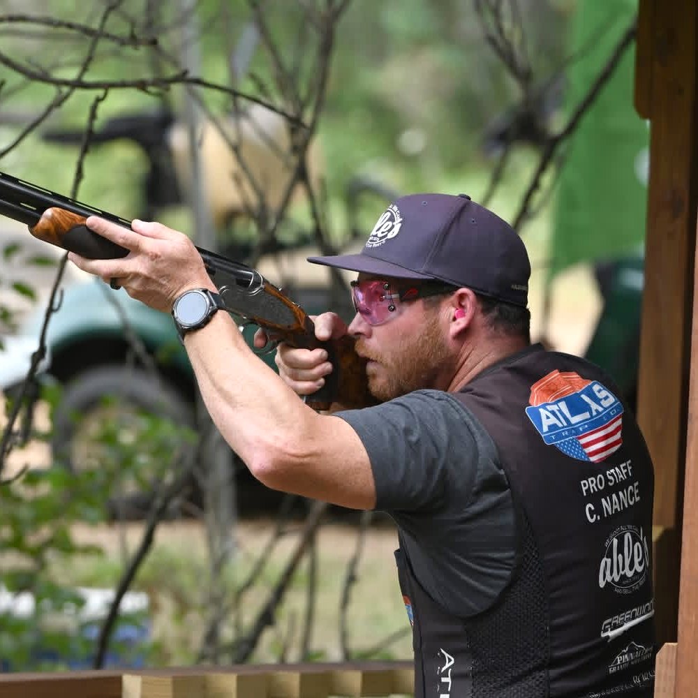 Clayton Nance shooting from a sporting clays stand