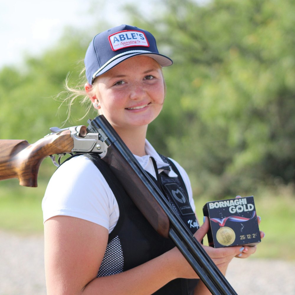 Kayli DeVusser with her shotgun and Bornaghi Gold shells